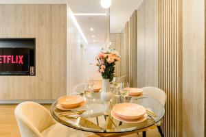 Televízia a/alebo spoločenská miestnosť v ubytovaní Lumina lux apartment on Drewnowska
