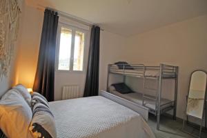 Posteľ alebo postele v izbe v ubytovaní La reserve