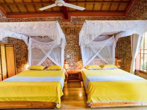 Postel nebo postele na pokoji v ubytování Ninh Binh Eco Garden