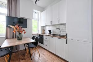 Η κουζίνα ή μικρή κουζίνα στο CityCenterApartments-M32-8C