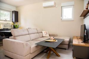 Χώρος καθιστικού στο Apartman Etna Međugorje