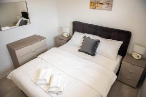 Ένα ή περισσότερα κρεβάτια σε δωμάτιο στο Apartman Etna Međugorje
