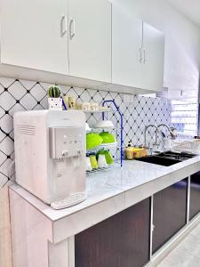 Η κουζίνα ή μικρή κουζίνα στο The Cozy Home +25 φωτογραφίες