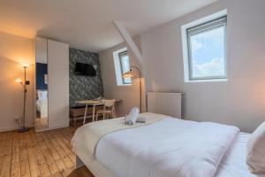 En eller flere senge i et værelse på Studio équipé proche centre-ville et métro