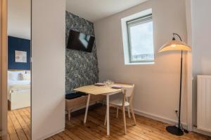 Et tv og/eller underholdning på Studio équipé proche centre-ville et métro