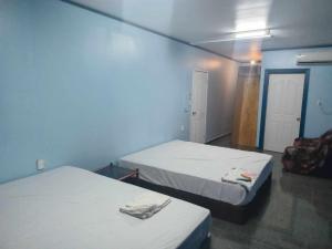 Postel nebo postele na pokoji v ubytování Julas Guesthouse