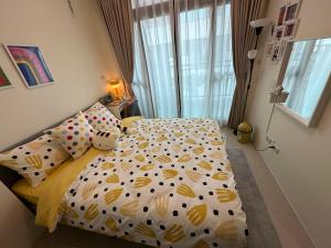 TEN HOUSE房間的床