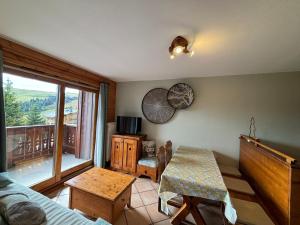 Χώρος καθιστικού στο Appartement Savoyard Confortable aux Saisies avec Piscine 6 pers, Proche Pistes et Commerces - FR-1-293-224