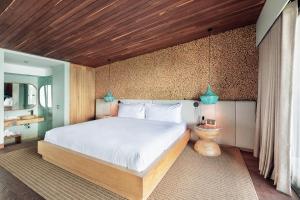 Letto o letti in una camera di The Brown, Guatape, Autograph Collection