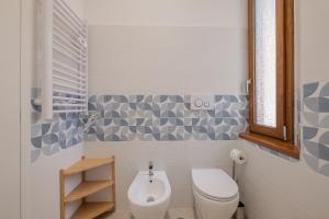 Koupelna v ubytování LE TRE M - Guesthouse