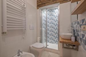 Koupelna v ubytování LE TRE M - Guesthouse
