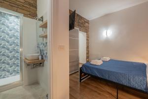 Postel nebo postele na pokoji v ubytování LE TRE M - Guesthouse
