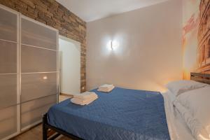 Postel nebo postele na pokoji v ubytování LE TRE M - Guesthouse