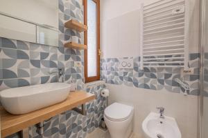 Koupelna v ubytování LE TRE M - Guesthouse