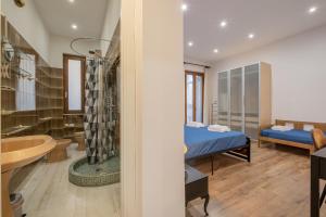 Postel nebo postele na pokoji v ubytování LE TRE M - Guesthouse