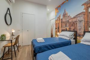 Postel nebo postele na pokoji v ubytování LE TRE M - Guesthouse