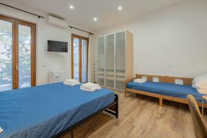 Postel nebo postele na pokoji v ubytování LE TRE M - Guesthouse