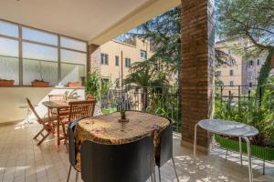 Balkón nebo terasa v ubytování LE TRE M - Guesthouse