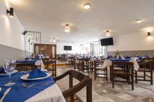 TV a/nebo společenská místnost v ubytování Hotel Bedd Express Querétaro