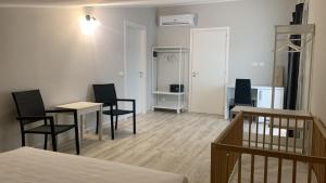 Posteľ alebo postele v izbe v ubytovaní Amada Hotel Siracusa