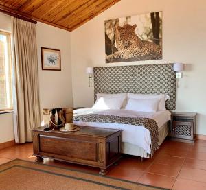 Letto o letti in una camera di Pakamisa Private Game Reserve