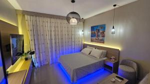 Postel nebo postele na pokoji v ubytování G Cribs Stylish Studio + 17 fotografií