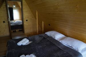 Letto o letti in una camera di UnderHill Kazbegi