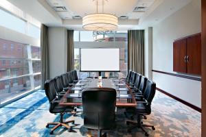 a conference room with a long table and chairs at The Westin Memphis Beale Street in Memphis