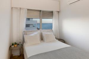 Posteľ alebo postele v izbe v ubytovaní Amazing Sea View and Location