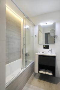 Koupelna v ubytování Hotel Alameda