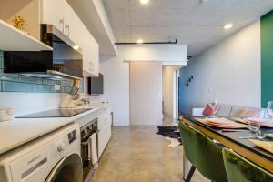 Η κουζίνα ή μικρή κουζίνα στο Nice&Cozy Loft URBN Escalante