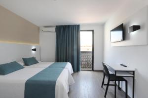 Postel nebo postele na pokoji v ubytování Hotel Alameda + 37 fotografií
