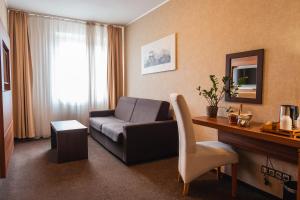 TV a/nebo společenská místnost v ubytování PREMIUM Business Hotel Bratislava
