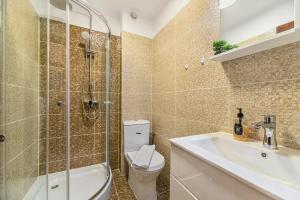 Et badeværelse på Apartament Tyana + 29 billeder