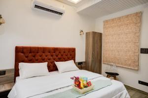 Postel nebo postele na pokoji v ubytování Amaltaash by Sandane Homes