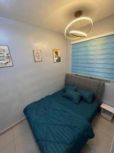 Posteľ alebo postele v izbe v ubytovaní Setapak KL Apt 3 Room 8 pax