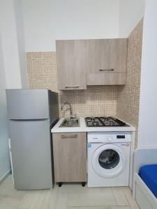 Kuchyň nebo kuchyňský kout v ubytování Alloggio Azzurro a pochi passi dal mare