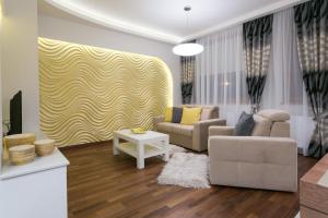 Posedenie v ubytovaní VIP Apartamenty Gorące Źródła