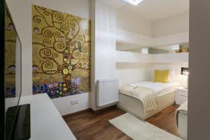 Posteľ alebo postele v izbe v ubytovaní VIP Apartamenty Gorące Źródła