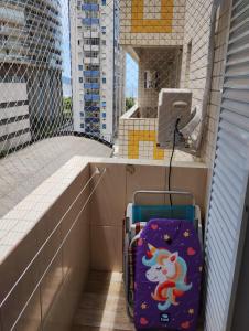 En balkon eller terrasse på Apartamento Santos Avenida Praia