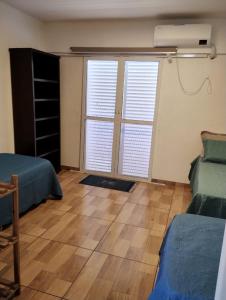 Et opholdsområde på Apartamento Santos Avenida Praia