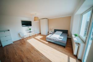 Posteľ alebo postele v izbe v ubytovaní Hotel Leo