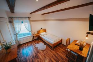 Posteľ alebo postele v izbe v ubytovaní Hotel Leo