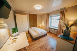 Posteľ alebo postele v izbe v ubytovaní Hotel Leo