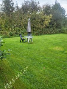 Taman di luar Astrup vig Spa og Sauna