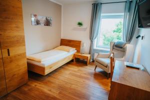 Posteľ alebo postele v izbe v ubytovaní Hotel Leo