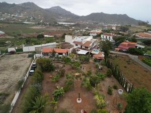 an aerial view of a town with mountains in the background at Vuelve al Origen - Nómadas Digitales in Tegueste