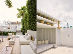 a patio with white furniture and plants on a building at Arco Phuket Town in Phuket Town