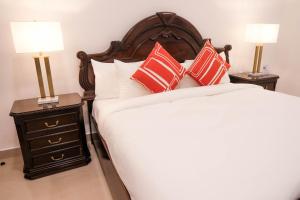 Hotel H4客房内的一张或多张床位