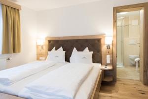 Postel nebo postele na pokoji v ubytování Appartement Landhaus KERSCHDORFER
